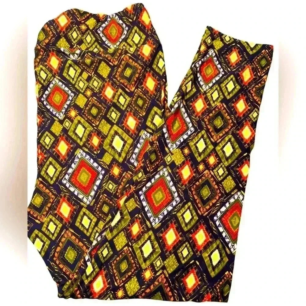 Lularoe TC2 navy & chartreuse geo leggings.OG designer Patrick quality & fit
